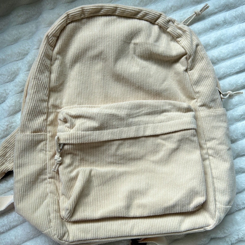 Cute beige backpack